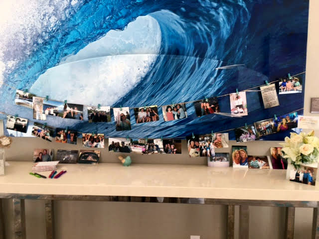 Friends Bringing Photos to Hang at Reception