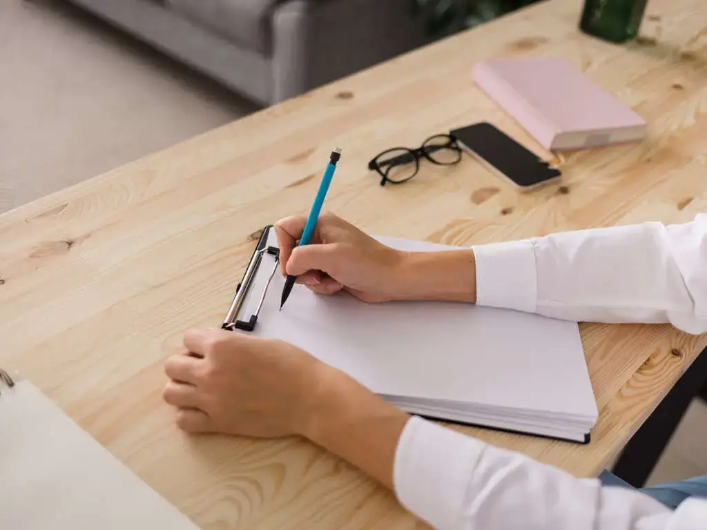 Person Looking Over End Of Life Checklist | Eternally Loved